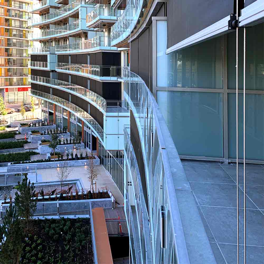 Balcony of a high rise building showing the Habitat plus screen with the metal cord.